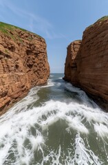 Wall Mural - Dramatic coastal cliffs with crashing waves