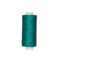 blue spool of sewing thread isolated on white background close up