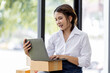 © David - Portrait business woman smile and use laptop checking information on parcel shipping box before send to customer. Entrepreneur small business working at home. SME business online marketing.