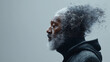 © Abelorz - A profile side view of an old black man with gray hair and beard, his head is disintegrating into particles isolated light grey background. Lost memory from dementia or alzheimer disease concept.