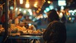 © bajita111122 - A close-up shot of a person enjoying a meal by the roadside, with a night market in the background