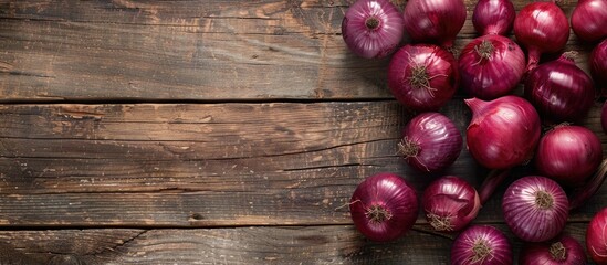 Aufkleber - Red onions arranged beautifully on a wooden surface providing ample copy space image for your content