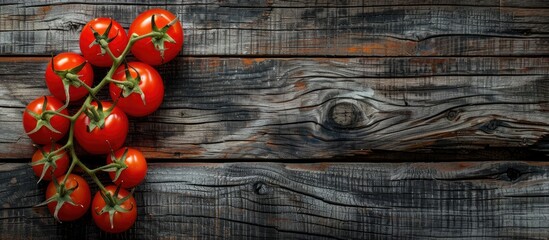 Poster - Rustic style tomatoes on a wooden backdrop in a flat lay food background with copy space image