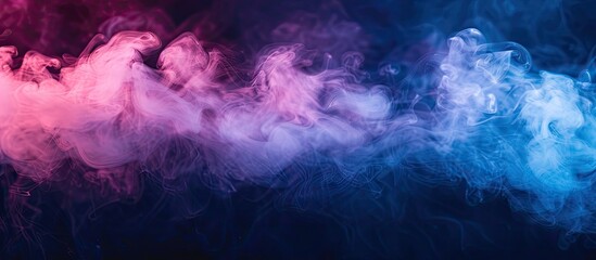 Leinwandbilder - A dreamy mix of blue and pink steam over a dark backdrop with a designated area for additional content in the picture, called copy space image.