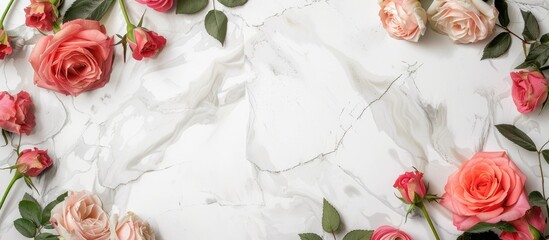 Poster - Top view flat lay of a congratulatory frame adorned with roses and leaves on a white marble backdrop featuring copy space for adding text or images