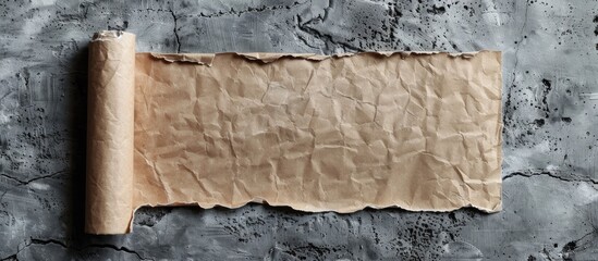 Poster - Craft empty paper stick with a seamless pattern on a concrete wall background ideal for creating a memorable copy space image