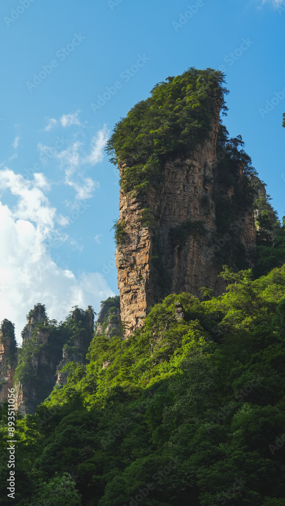 Zhangjiajie national forest park, China, Glass bridge of Zhangjiajie China Tianzishan with blue sky, concept of world heritage, avatar, heritage peak or cliff mountain, tourist attraction famous place