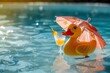 © Olha - Inflatable yellow mini duck, cocktail stand near swimming pool on bright sunny day, copy space.