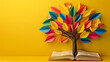 © john - Colorful tree of knowledge made from books and paper leaves on vibrant yellow background, symbolizing literacy and education, education, books, tree, paper leaves, colorful