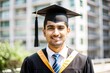 © N7 - Indian student wearing graduation cap and gown