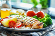© Punprapa - Healthy fitness meal, a plate of salad with lemon, cherry tomatoes and salad on the side. healthy eating concept,