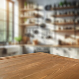 Fototapeta Mapy - Empty wooden table with copy space for products. Blurred bright kitchen interior background. 