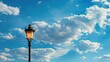© chanidapa - Classic lamp post with blue sky background, clouds drifting by
