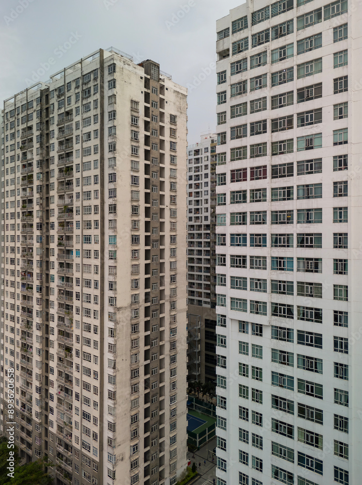 High Rise Front View Massive hi rise residential building facades aerial view in vertical ...