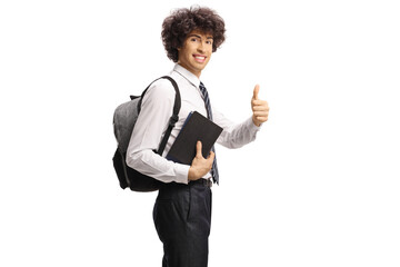 Sticker - Male college student holding books and gesturing thumbs up