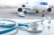 © Kowit - Concept of traveling for medical treatment, stethoscope and airplane
