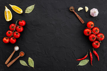 Wall Mural - Cooking concept with tomatoes and chili peppers, vegetables spices on the kitchen desk top