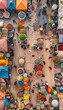 © spyrakot - Aerial View of Bustling Moroccan Market with Colorful Stalls, Spices, and Fabrics for Cultural Richness