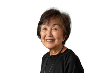 Wall Mural - Positive senior Asian woman with short hair, smiling directly at camera, isolated on white background