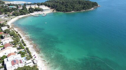 Wall Mural - Rovinj, a picturesque coastal town on the Istrian peninsula of Croatia, is a dreamy destination for summer vacations, and when captured by drone, Croacia