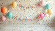 © addymawy - A festive room with colorful balloons confetti and bunting for a birthday celebration