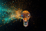 Fototapeta Do przedpokoju - Bright idea exploding lightbulb with colorful powder on black background