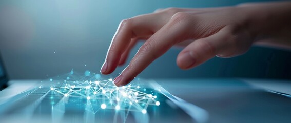 the hand on top, with an outstretched finger about to press down onto a laptop keyboard.