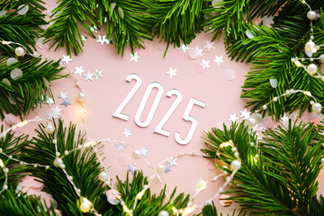 Wall Mural - new year 2025 pink background. number of the coming year in christmas decoration.