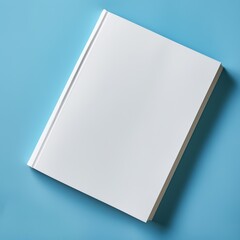 mock up of blank white book cover on a blue background 