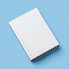 mock up of blank white book cover on a blue background 