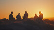 © deimos.az - Silhouette of 5 young boys speaking in a top of mountain enjoying the view of nature