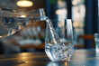 © Imane - refreshing pure water pouring into glass bottle hydration concept
