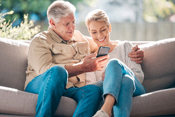 Canvas Print - Smile, senior couple and sofa with phone for browsing social media, streaming video and reading online news. Happy elderly woman and man with mobile of communication, article or hug together at house