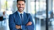 © Krystian - Confident Senior Businessman with Grey Hair Smiling in Office Environment