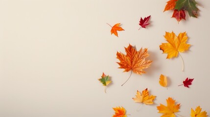 Wall Mural - A white background with a bunch of orange leaves scattered around it