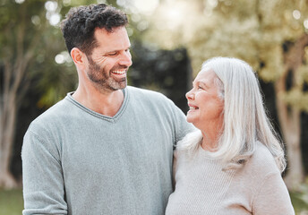 Canvas Print - Hug, man and senior mom in garden with smile, gratitude and care with outdoor bonding together. Love, elderly mother and adult son in backyard with embrace, support and happy family laughing in park