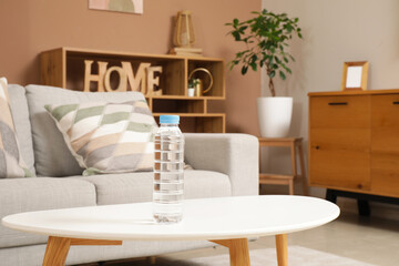 Sticker - Bottle of water on table in living room