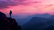 © Pretty Panda - Silhouette of a hiker against a stunning mountain vista at dusk, the sky painted in shades of pink and purple
