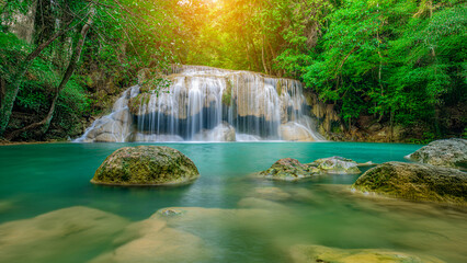 Wall Mural - Beauty in nature, amazing waterfall in tropical forest of national park, Thailand