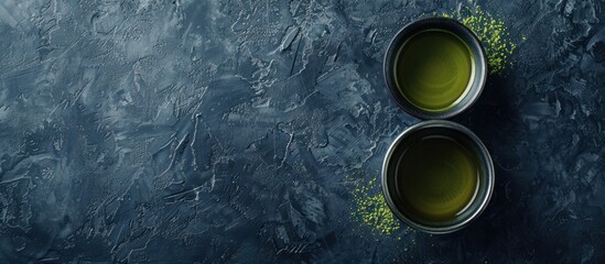 Canvas Print - Two Cups of Matcha Tea on Blue Background