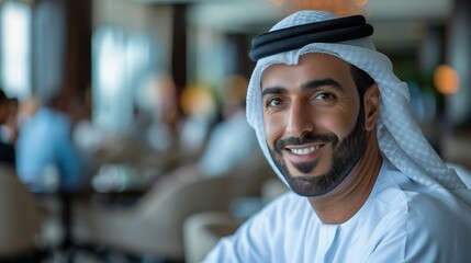 Portrait of a smiling Emirati man in traditional clothing