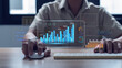 © Thanadon88 - Businessman analyzes virtual profits, predicts company business growth in 2025, annual financial report 2025 with year data statistics.