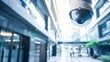 © Purichaya - CCTV camera overlooking a building entrance, security surveillance, access control