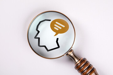 Wall Mural - Communication concept.  Magnifying glass on a white background