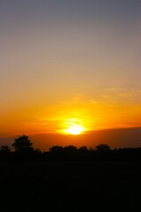 Wall Mural - Sunset Sky Clouds in the evening with Red, Orange, Yellow and purple sunlight on Golden hour after sundown, Romantic sky in summer on Dusk Twilight. heart sky.