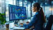 © GoodandEvil - Woman analyzing data with charts on computer screen