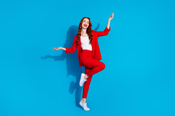 Canvas Print - Full length photo of adorable nice gorgeous girl wear red trendy clothes isolated on blue color background