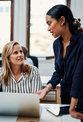 Wall Mural - Business women, laptop and training help on creative project management, task and teamwork deadline. Information, quests and feedback in office collaboration for design company, development or agency