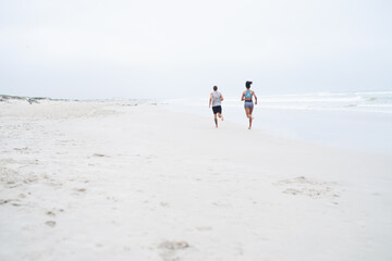 Poster - Running, beach and couple with fitness, challenge and cardio with balance, endurance and support. Seaside, back and man with woman, ocean and workout with training, exercise and wellness with health