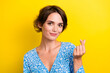 © deagreez - Portrait of pleasant pretty girl with short hairstyle wear blue blouse fingers showing k-heart symbol isolated on yellow color background